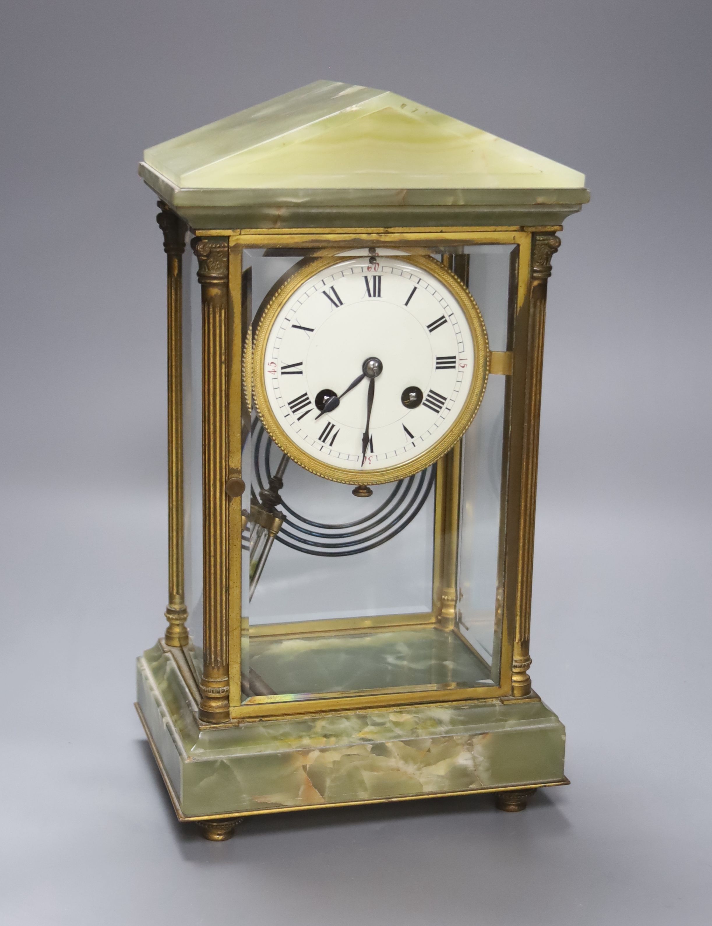 A French green onyx and gilt brass four glass mantel clock, height 32cm